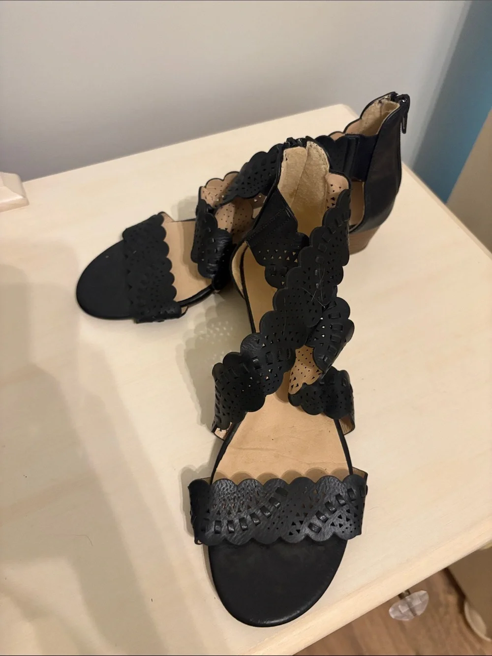XOXO Black Scalloped Laser-Cut Zip Back Sandals